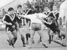 Sam Stewart on the left, and Adrian Shelford on the right take down Kevin Ward - Newcastle styles!