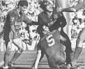 Steve Fulmer and Tony Butterfield celebrate Brian Quinton's try under the posts.