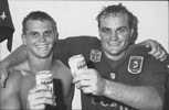 Paul Harragon and Mark Sargent raise their glasses to a Knights victory.