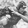 Mark Sargent just about breaks free of an Eels tackle.