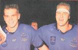 The two Pauls - Harragon and Sironen - celebrate the series victory.