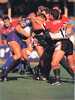 Paul Harragon puts the head down in a rhino-like charge.