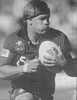 Paul Marquet about to take a tackle.