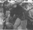 Paul Harragon wrestles with Trevor Gillmeister.