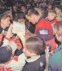 Harragon signing autographs after the win.
