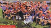 The winning Knights reserve grade side celebrates.