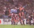Paul Harragon is picked up and smashed by Wayne Bartrim.