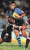 Andrew Johns looks for support.