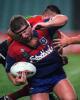 Glenn Grief is tackled.