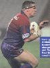 Tony Butterfield smashes it forward.