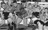 Paul Harragon almost gets past a North Sydney Bear.