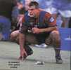 Paul Harragon crouched on the sideline, waiting to return to action.