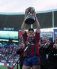 Paul Harragon hoists the Optus Cup high.