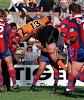 Glenn Morrison is picked up by Matthew Johns and Leo Dynevor.