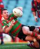 Robbie O'Davis makes a great tackle on Danny O'Keefe.
