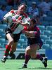 Dean Amos escapes the clutches of a Knight on day one.