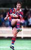Andrew Johns boots it down-field in the years opening game.