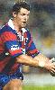 Peter Shiels dummies to pass.