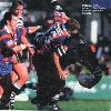 Bill Peden makes a colossal tackle.