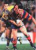 Peter Shiels is tackled.