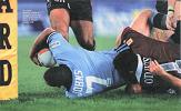 Andrew Johns is pulled down desperately short.