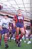 Paul Harragon leads out the first sporting team onto Stadium Australia.
