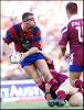 Tony Butterfield offloads.