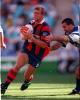 Bill Peden finds a hole in the Dogs defence.