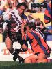 Sean Rudder tackles Cliff Lyons.