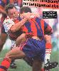Rod Wishart pulls a Knight to ground.