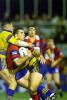 Peter Shiels is tackled ...