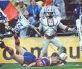 Timana Tahu dives over for a late try.