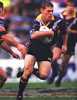Brett Kimmorley on the run.