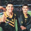 Trent Barrett and Andrew Johns celebrate a win over Papua New Guinea.
