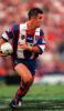 Andrew Johns makes a run.
