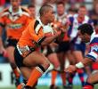... is tackled by Matty Johns.