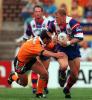 ... tries to get past a tackle ...