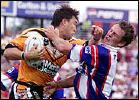 Terry Hill pushes off Mark Hughes ...