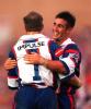 Andrew Johns and Adam MacDougall celebrate more points.