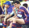 Matthew Gidley watches the carve-up from the bench.