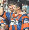 Robbie O'Davis and Bill Peden celebrate a try.