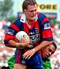 Mark Hughes gets past his man.