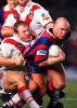 Ben Kennedy just about breaks the tackle.