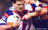 Matthew Gidley is tackled.
