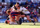Ben Donaldson is tackled.