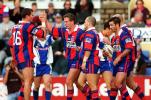 The boys celebrate a try.