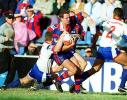 Mark Hughes is dragged down by the Warriors.