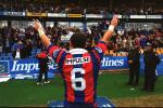 Matthew Johns thanks the crowd for their support.