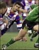 Andrew Johns can't stop a Raider slipping through.