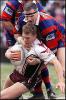 Tony Butterfield makes a tackle.